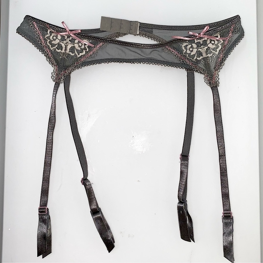 Calvin Klein garter belt in grey lace with cream lace accents.